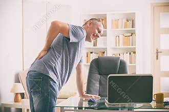 Man suffering from low back pain