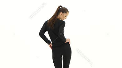 Girl advertises clothes. White background. Back view