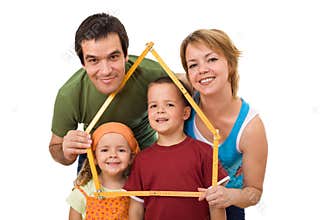 Happy family with their kids - real estate concept