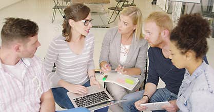 Young people discussing project