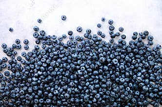 Texture of blueberry berries close up. Border design. Fresh blueberries background with copy space for your text. Vegan
