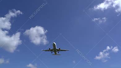 Airplane Flying Overhead – Fixed Low Angle View