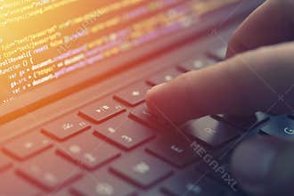 Closeup coding on screen, hands coding html and programming on screen laptop, web development, developer