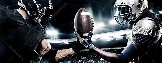Two american football sportsman players on stadium. Sport concept.