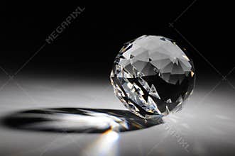 Sparkling crystal on gradient background