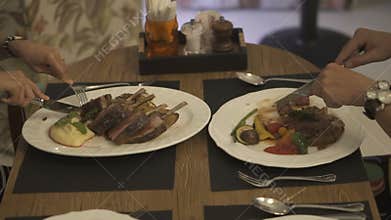 Couple eating delicious dinner in a restaurant