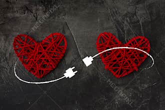 Two hearts connected by USB cable