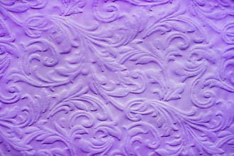 Purple background in the form of an ancient baroque repeating design