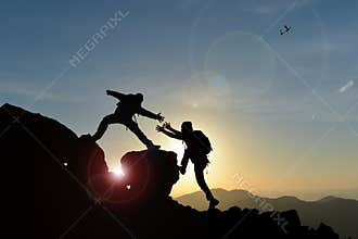 Climber giving a hand to another