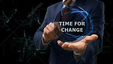 Businessman shows concept hologram Time for change on his hand