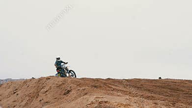Motocross. Riders jumping. Off-road racing on enduro bikes. Slow motion