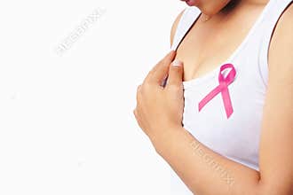 Woman holding breast with pink ribbon