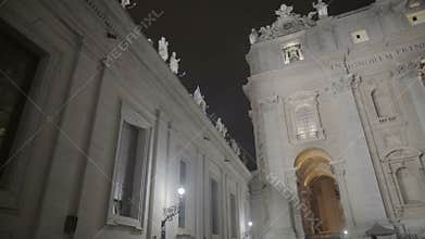 Statues of Apostles on top of St Peter's Basilica church in Vatican City, Italy