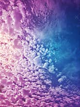 Beautiful Purple fluffy Clouds in sky