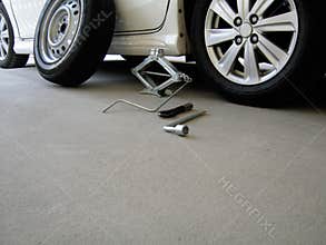 Tool kit for changing car tires.