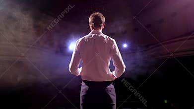 Speaker giving a talk on corporate Business Conference. Audience at the conference hall. Business and Entrepreneurship