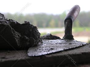 Bricklayers Trowel and Mortar