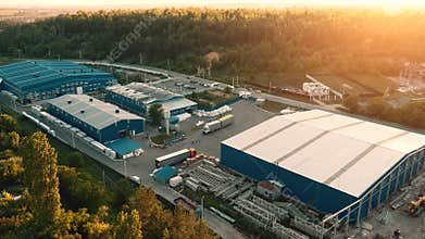 Aerial view of warehouse storages or industrial factory or logistics center from above. Aerial view of industrial buildings
