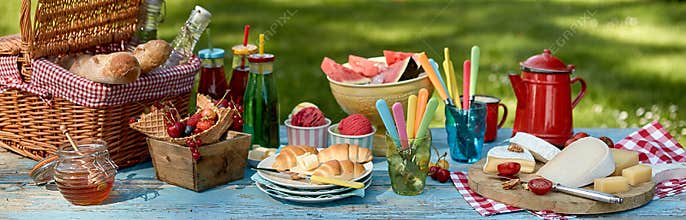 Panorama banner with a healthy summer picnic