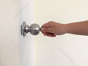 Open the door with a key.