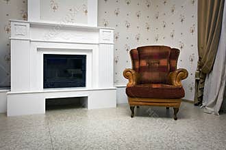 View of chair and fireplace
