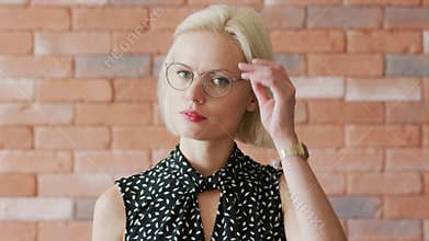 Elegant woman scratching head