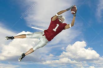 Football Catch With Clouds