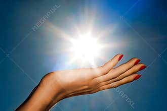 Hand and sun