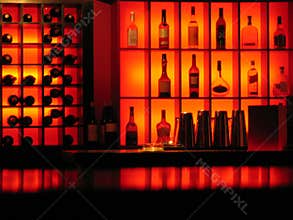 backlighted bottles club bar background