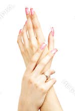 Two hands with pink acrylic na