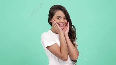 beauty portrait of cute happy kid long curly hair and smooth healthy skin, skincare