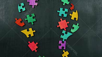 New ideas and creativity. Creating light bulb from color puzzles.