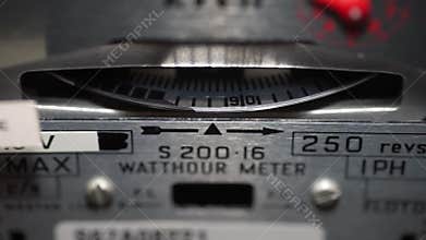 Spinning electric meter dial. Energy, power, and meter reading.