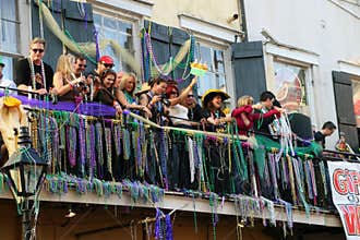 People celebrated crazily in Mardi Gras parade.