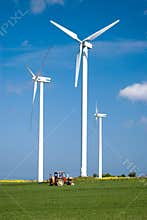 Wind power and tractor.