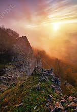 Dramatic sunrise in mountains with fog and sun - landscape panorama, Slovakia