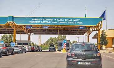 Cars at customs chekpoint crossing Bulgaria - Romania state border