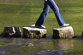 Crossing three stepping stones in a river