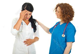 Doctor comforting sick colleague