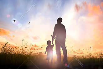 Father And Child Silhouette Holding Hands At Sunset Family Love Concept