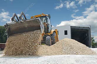 Excavator unload gravel