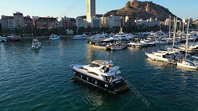Aerial view of the mooring full of vessels in Marina Alicante, Spain.