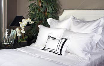 Hotel Bed And White Linen