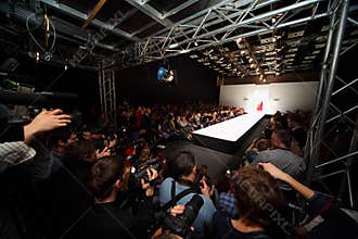 Two models go on catwalk at fashion show