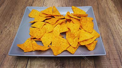 Tortilla chips on rotating plate - stop motion animation