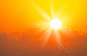 Brilliant orange sunrise over clouds