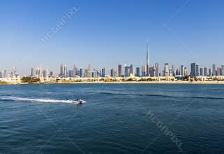 Dubai, UAE - 02.27.2021 Dubai public beach with city skyline on background. Outdoors