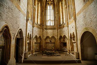 Interior of Chapel of St. Archangel Michael in medieval castle Bezdez, gothic arched windows in church, rib vault, altar part,