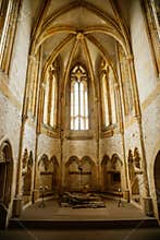 Interior of Chapel of St. Archangel Michael in medieval castle Bezdez, gothic arched windows in church, rib vault, altar part,
