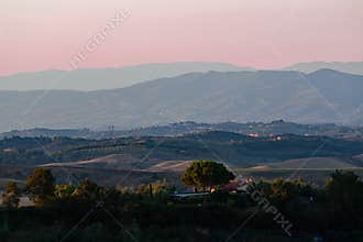 Sunrise in hills of Tuscany